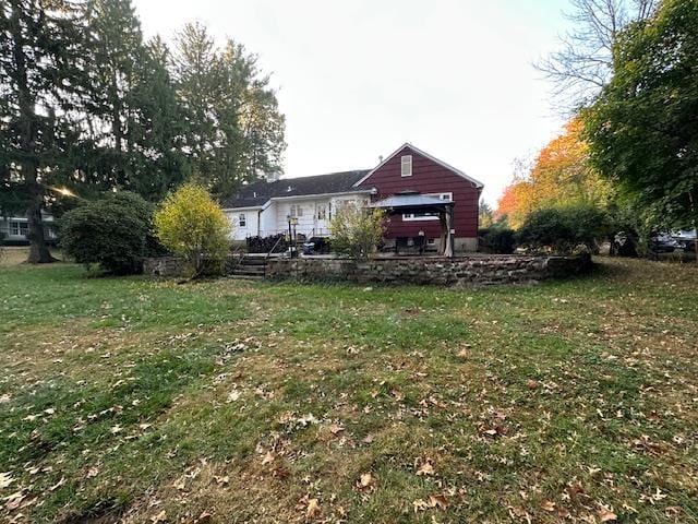 158 Parrott Rd, West Nyack, NY 10994 - back of property featuring a lawn