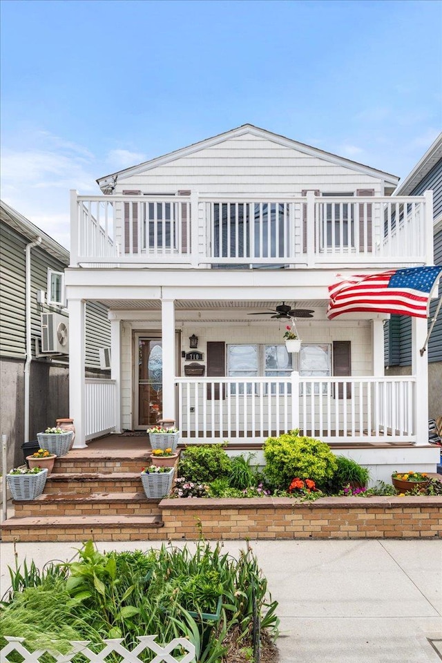 0 Cross Bay Blvd, Broad Channel, NY 11693 - view of front of home with a balcony, covered porch, and cooling unit