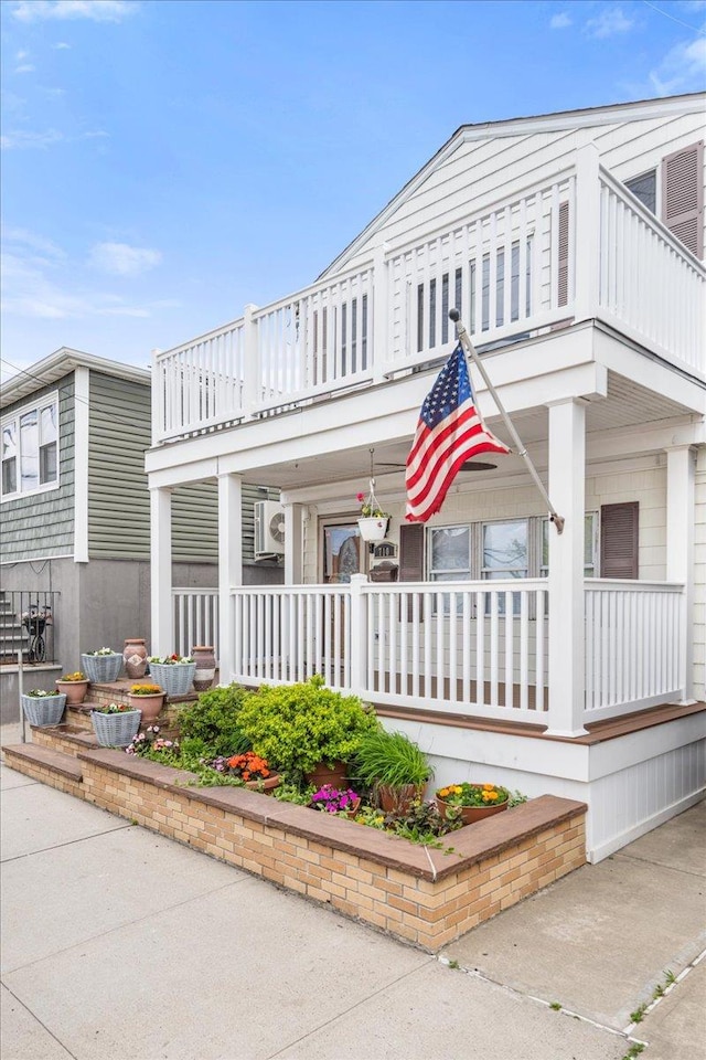 0 Cross Bay Blvd, Broad Channel, NY 11693 - view of front facade featuring a balcony and a porch