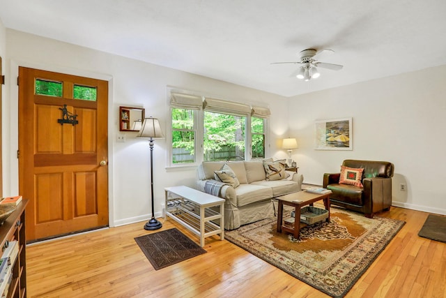 512 Watson Woods Rd, Woodstock, NY 12498 - living room featuring ceiling fan, light wood-type flooring, and baseboards