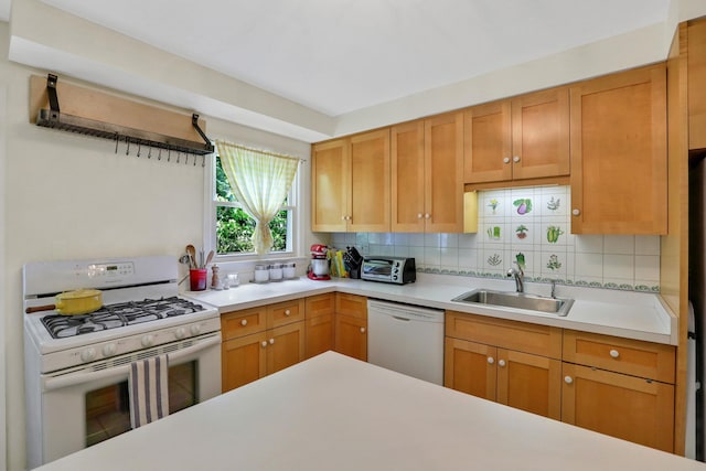 512 Watson Woods Rd, Woodstock, NY 12498 - kitchen featuring white appliances, a sink, light countertops, and tasteful backsplash