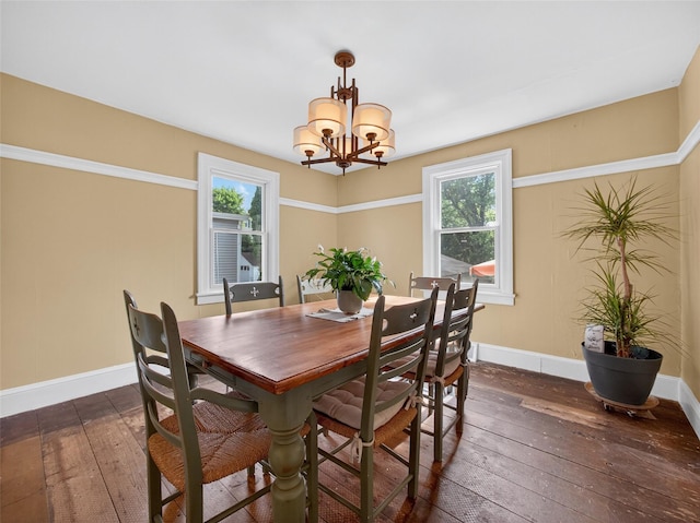 31 Hudson Ave, Stony Point, NY 10980 - dining room with dark wood-type flooring, a chandelier, and healthy amount of natural light