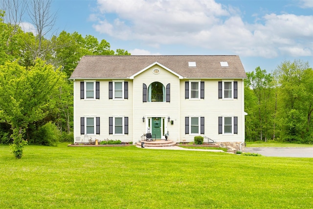 12 Broadview Ln, Red Hook, NY 12571 - colonial-style house with a front lawn and a shingled roof
