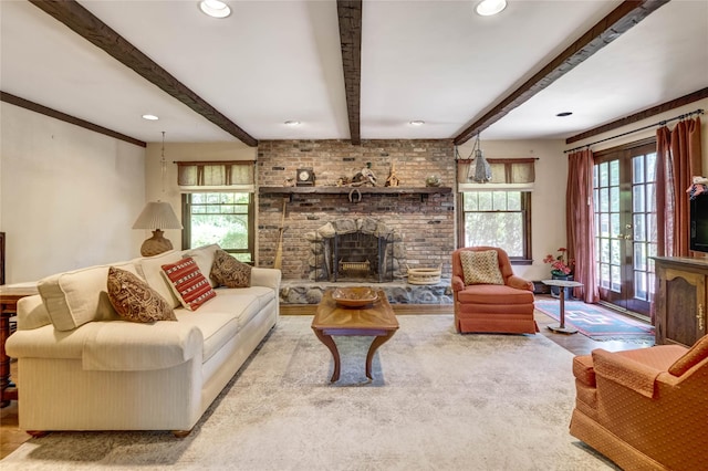100 Foxhunt Cres, Oyster Bay Cove, NY 11791 - living room with plenty of natural light, beamed ceiling, a fireplace, and recessed lighting