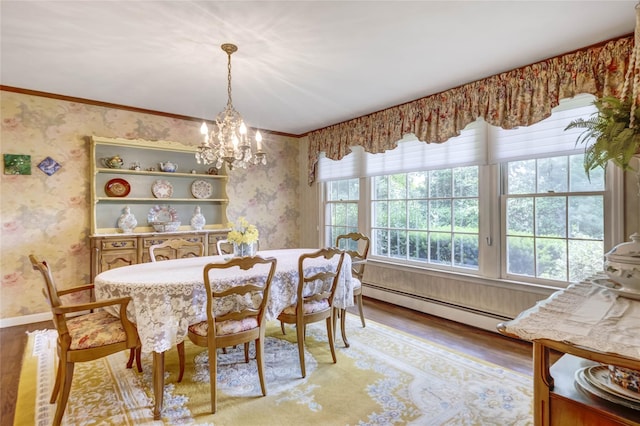 100 Foxhunt Cres, Oyster Bay Cove, NY 11791 - dining room with wallpapered walls, light wood-type flooring, a chandelier, a baseboard heating unit, and baseboards