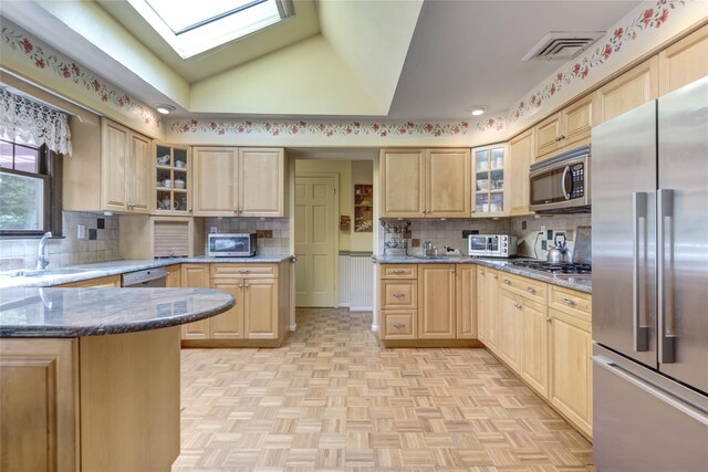 100 Foxhunt Cres, Oyster Bay Cove, NY 11791 - kitchen with stainless steel appliances, a sink, and light brown cabinets
