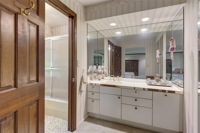 100 Foxhunt Cres, Oyster Bay Cove, NY 11791 - full bath featuring ensuite bath, wallpapered walls, vanity, enclosed tub / shower combo, and recessed lighting