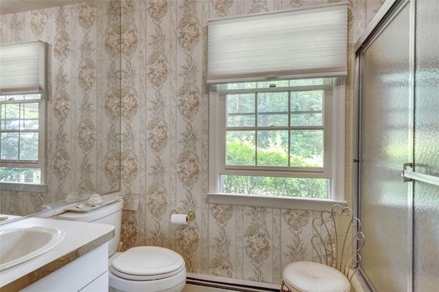 100 Foxhunt Cres, Oyster Bay Cove, NY 11791 - full bathroom featuring baseboard heating, healthy amount of natural light, toilet, vanity, and wallpapered walls