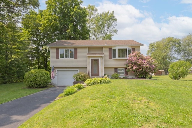 6 Regency Dr, Wappingers Falls, NY 12590 - bi-level home with asphalt driveway, an attached garage, and a front yard