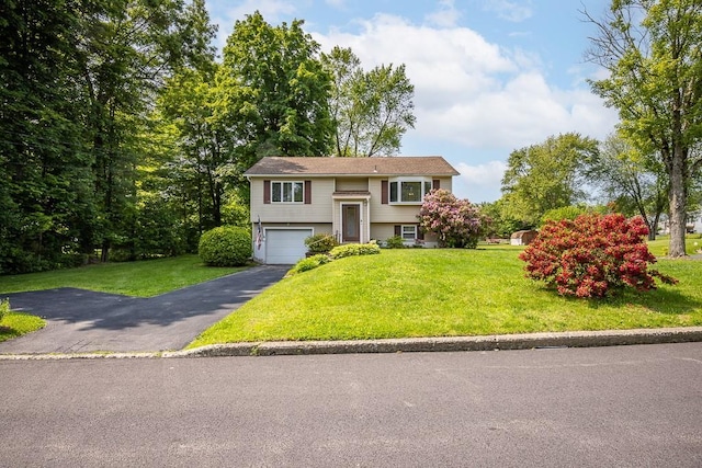 6 Regency Dr, Wappingers Falls, NY 12590 - split foyer home featuring driveway, a garage, and a front yard