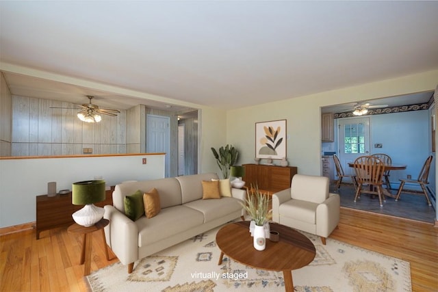 6 Regency Dr, Wappingers Falls, NY 12590 - living area featuring a ceiling fan, wood finished floors, and baseboards