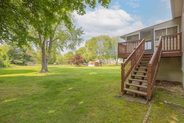 6 Regency Dr, Wappingers Falls, NY 12590 - view of green lawn with stairway and a wooden deck