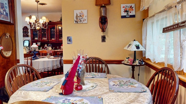 4 Christine Dr, Spring Valley, NY 10977 - dining space with a chandelier