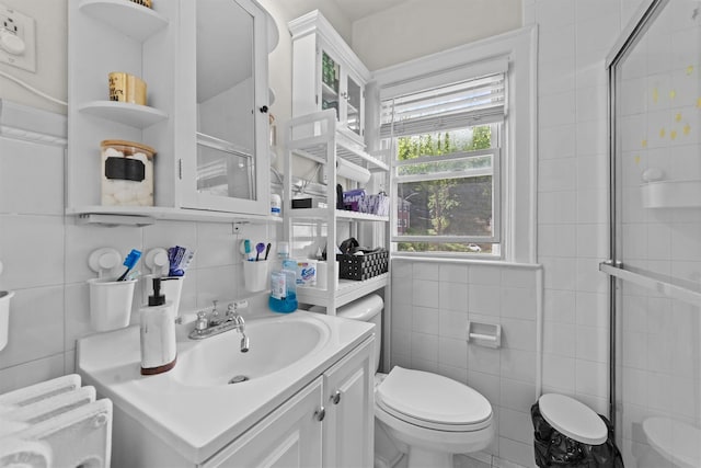 107 Underhill Ave, West Harrison, NY 10604 - bathroom featuring tile walls, toilet, tiled shower, and vanity