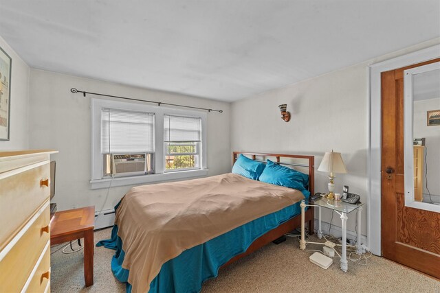 107 Underhill Ave, West Harrison, NY 10604 - bedroom with cooling unit, carpet floors, and a baseboard heating unit