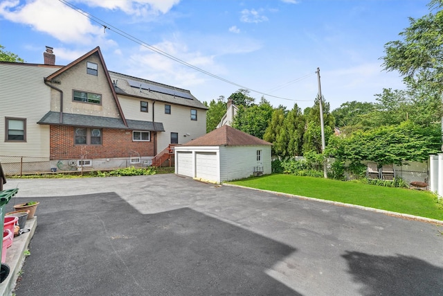 107 Underhill Ave, West Harrison, NY 10604 - view of patio with an outbuilding and a garage