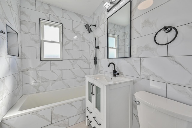 117-07 202nd St, Saint Albans, NY 11412 - full bathroom with healthy amount of natural light, toilet, vanity, tile walls, and a combined bath / shower with marble appearance
