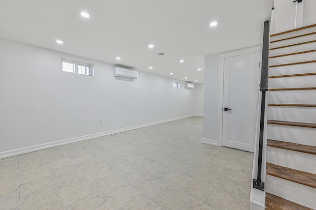 117-07 202nd St, Saint Albans, NY 11412 - below grade area with a wall mounted AC, stairs, recessed lighting, and baseboards