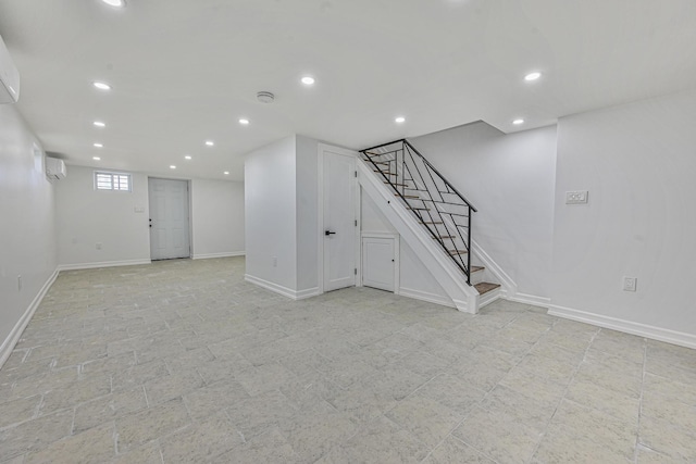 117-07 202nd St, Saint Albans, NY 11412 - basement featuring stairway, recessed lighting, baseboards, and a wall unit AC