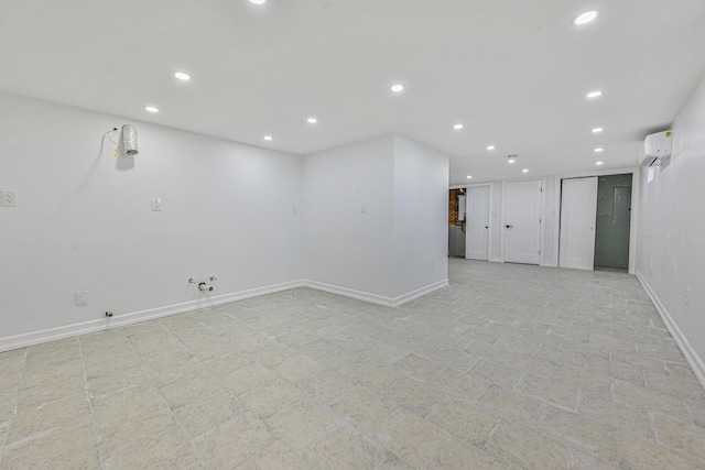117-07 202nd St, Saint Albans, NY 11412 - basement featuring recessed lighting, baseboards, and an AC wall unit