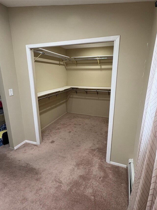 378 W Waukena Ave, Oceanside, NY 11572 - spacious closet with carpet floors and baseboard heating