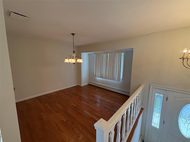 378 W Waukena Ave, Oceanside, NY 11572 - entryway featuring a chandelier, a baseboard radiator, and wood finished floors