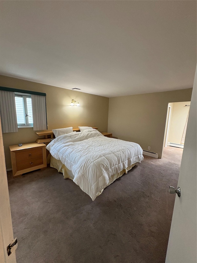 378 W Waukena Ave, Oceanside, NY 11572 - bedroom featuring dark carpet and a baseboard heating unit