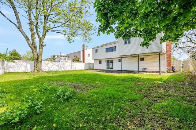 378 W Waukena Ave, Oceanside, NY 11572 - back of property featuring a fenced backyard