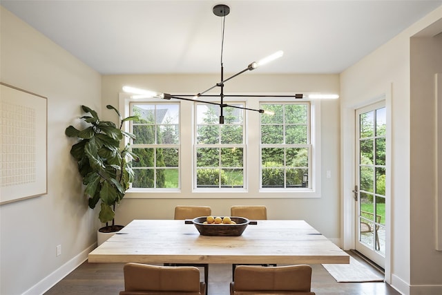 5 Rose Ln, Rye Brook, NY 10573 - dining room with a chandelier, baseboards, and dark wood-type flooring