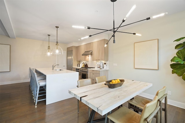 5 Rose Ln, Rye Brook, NY 10573 - dining area with dark wood-style flooring, baseboards, and a chandelier