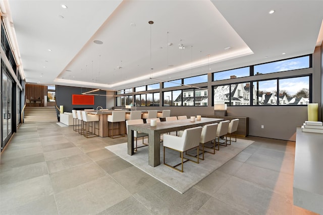 5 Rose Ln, Rye Brook, NY 10573 - dining space featuring a tray ceiling, plenty of natural light, and recessed lighting