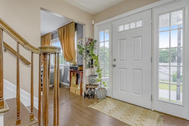 41 W Gate Rd, Suffern, NY 10901 - foyer with plenty of natural light, stairway, and wood finished floors