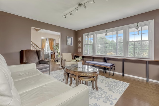41 W Gate Rd, Suffern, NY 10901 - living room with wood finished floors, rail lighting, and baseboards