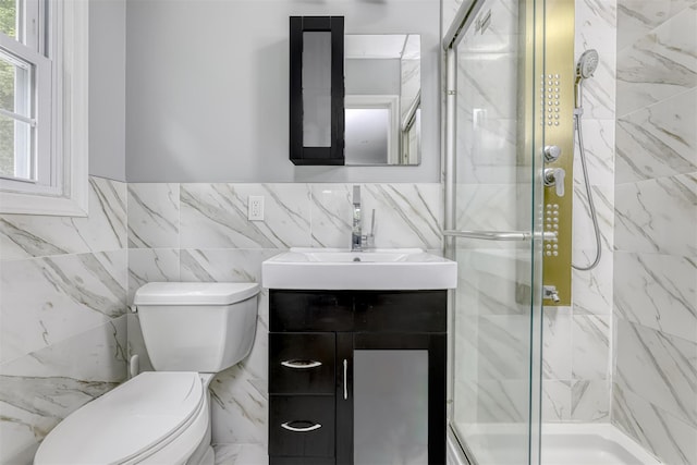 41 W Gate Rd, Suffern, NY 10901 - full bath featuring tile walls, a marble finish shower, vanity, toilet, and wainscoting