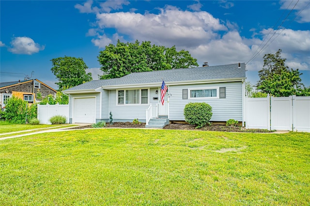 51 Franklin St, Brentwood, NY 11717 - single story home with a garage, driveway, and a shingled roof