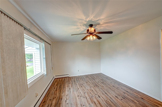51 Franklin St, Brentwood, NY 11717 - unfurnished room featuring wood finished floors, a ceiling fan, and baseboards