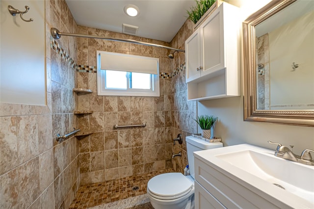 51 Franklin St, Brentwood, NY 11717 - full bathroom featuring vanity, toilet, and tiled shower