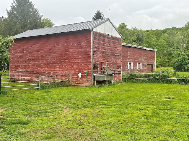 5646 Rte 82, Clinton Corners, NY 12514 - view of home's exterior with a barn, an outdoor structure, and metal roof