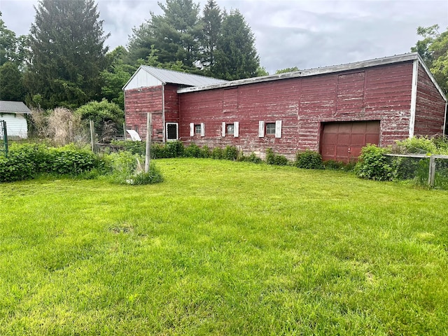 5646 Rte 82, Clinton Corners, NY 12514 - back of house with a lawn and an attached garage