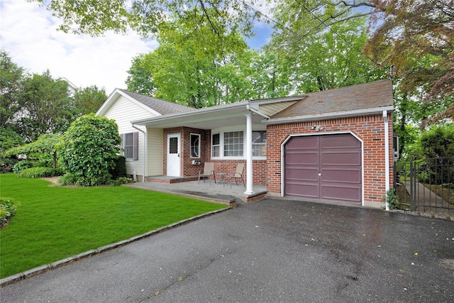 64 Church St, Syosset, NY 11791 - view of front of home with a garage, asphalt driveway, and brick siding