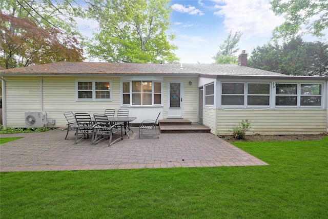 64 Church St, Syosset, NY 11791 - back of property with ac unit, a patio, a lawn, and a chimney