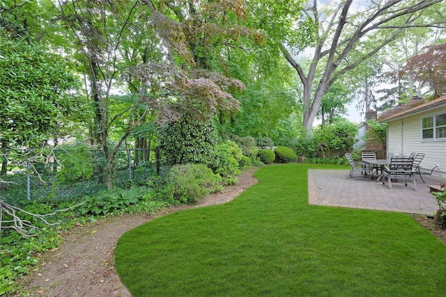 64 Church St, Syosset, NY 11791 - view of grassy yard featuring a patio area
