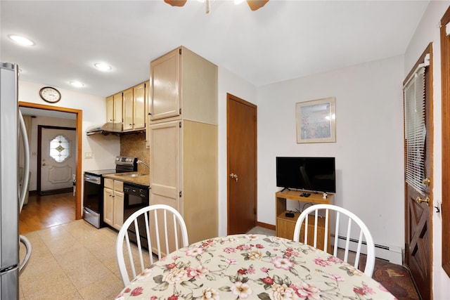 64 Church St, Syosset, NY 11791 - dining area featuring baseboard heating, recessed lighting, and baseboards