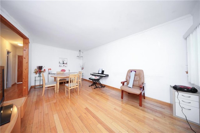 2366 E 29th St, Brooklyn, NY 11229 - dining space with light wood-style flooring and crown molding