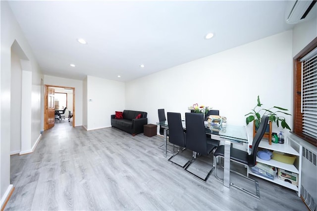 2366 E 29th St, Brooklyn, NY 11229 - office area with an AC wall unit, wood finished floors, recessed lighting, and baseboards