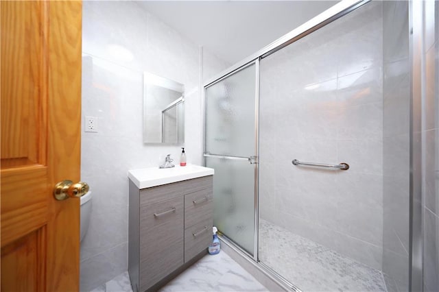 2366 E 29th St, Brooklyn, NY 11229 - full bath featuring a stall shower, vanity, toilet, and marble finish floors