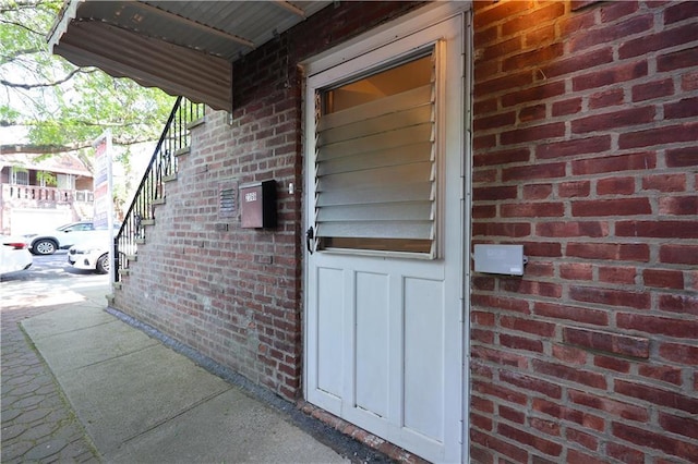 2366 E 29th St, Brooklyn, NY 11229 - view of exterior entry featuring brick siding