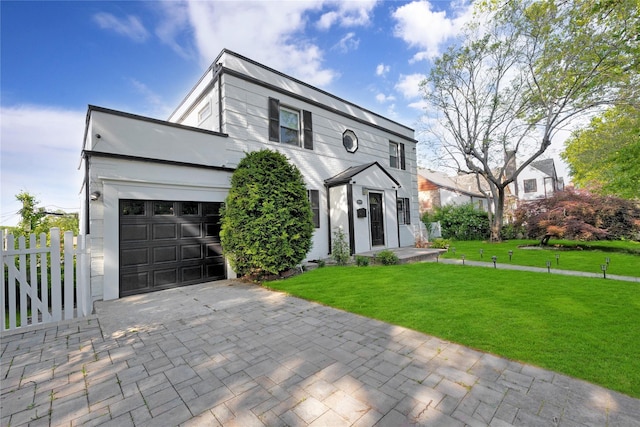 13915 Coolidge Ave, Briarwood, NY 11435 - view of front of house featuring an attached garage and decorative driveway