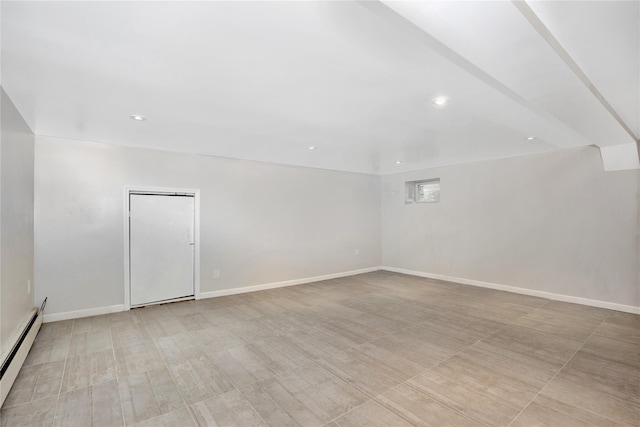 13915 Coolidge Ave, Briarwood, NY 11435 - bonus room featuring a baseboard heating unit, recessed lighting, and baseboards