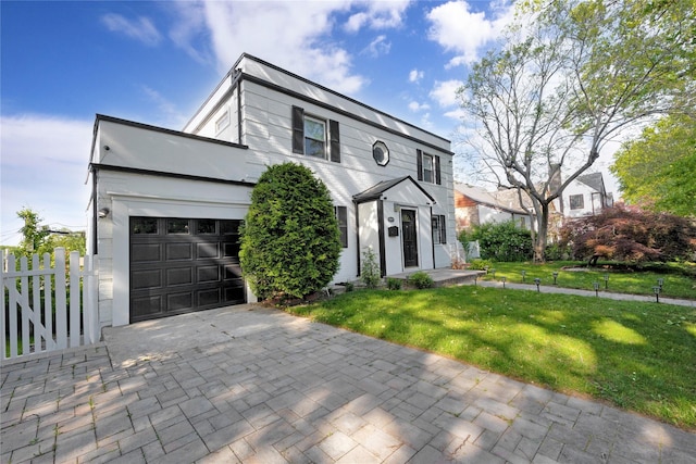 13915 Coolidge Ave, Briarwood, NY 11435 - view of front of property featuring an attached garage and decorative driveway